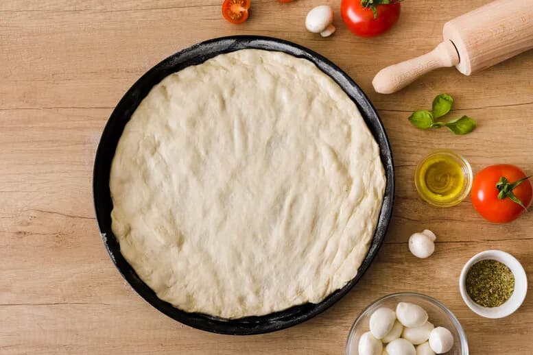 Jak zrobić miękkie ciasto na pizzę – sprawdzone techniki i porady